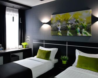 آرت هوتل بيشكيك - بيشكيك - غرفة نوم