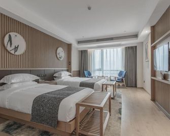 Sweetome Vacation Rentals (Chongqing Ronghui Hot Spring Town) - تشونغتشينغ - غرفة نوم