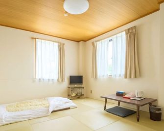 Business Hotel Takizawa Takasaki Station Nishiguchi - Takasaki - Slaapkamer