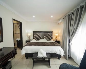 Dunwoodie Travel Lodge - Pretoria - Bedroom