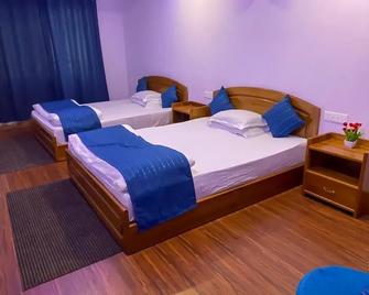 Hotel Arms - Kālimpong - Bedroom