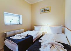 Aparthotel Stralsund Studios und Apartments - Stralsund - Bedroom