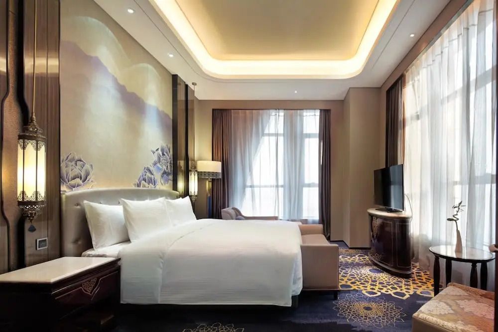 Wanda Vista Hotel Urumqi - أورومتشي - غرفة نوم