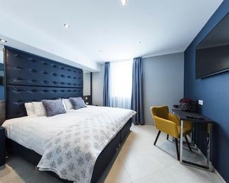 Hotel Tommasi - Mörfelden-Walldorf - Schlafzimmer