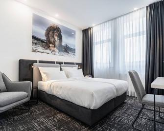 Libarty Hotels - Weinstadt - Schlafzimmer
