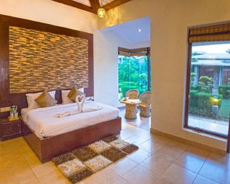 The Roar Resort - Rāmnagar - Bedroom