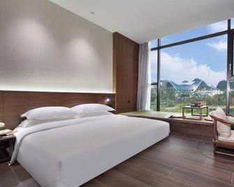 Riverside Wing Hotel Guilin - גילין - חדר שינה