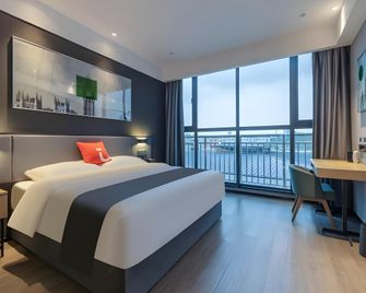 Thank Hotel Plus Shaoxing Luxun Hometown - שאושינג - חדר שינה