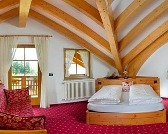 MyTime Hotels la Grotta - ויגו די פאסה - חדר שינה