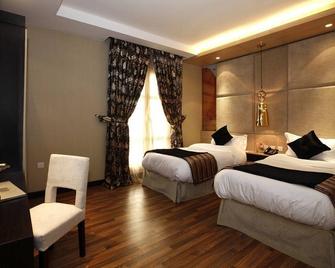 فندق جراند بلازا التخصصي-الرياض - الرياض - غرفة نوم