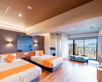 Livemax Resort Miyahama Onsen-Ocean - Hatsukaichi - Schlafzimmer