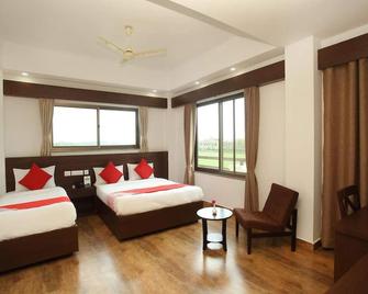 Hotel Aloka Inn - Lumbini Sanskritik - Спальня