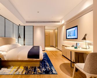 Echarm Hotel Mianyang Changhong Avenue Kaide Plaza - Mian Yang - Chambre
