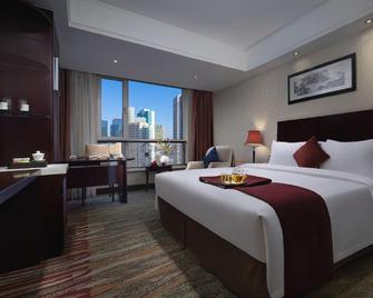 Xinwenyuan Hotel - Dalian - Bedroom