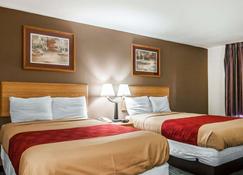 Econo Lodge Inn & Suites - Джексон - Спальня