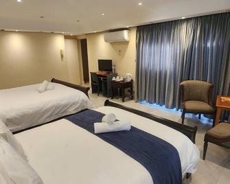 Orchids Lodge - Fourways - Slaapkamer