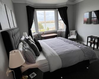 King suite with bay views- breakfast included - Stanley - Habitación