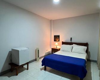 Hotel Armenia Centro - Armenia - Schlafzimmer