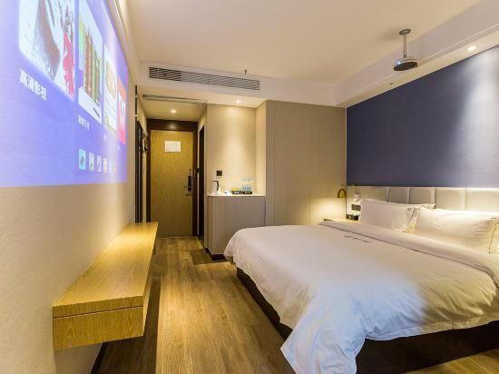 Wenrun Zhixing Holiday Hotel Nanjing Aoti Jiangdong Middle Road - نانجينغ - غرفة نوم