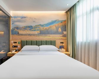 Qiankunrun Boutique Hotel (Jiang Bei Old Shteet Store) - Meizhou - Bedroom