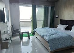 Blue Bird Home Stay - Mukteshwar - Yatak Odası