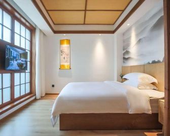 Huaihua Fengdan Hotel - Huaihua - Bedroom