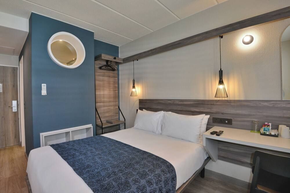 رود لودج إن1 سيتي - كابي تاون - غرفة نوم