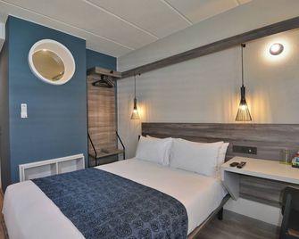 رود لودج إن1 سيتي - كابي تاون - غرفة نوم