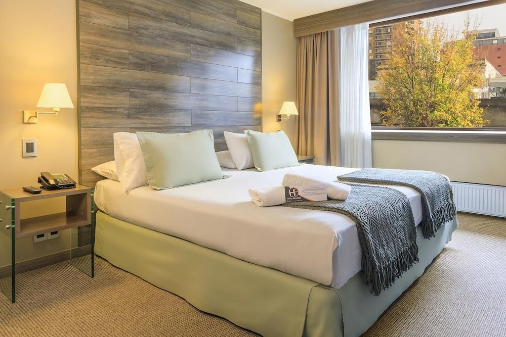 هوتل فرونتيرا بلازا - تيموكو - غرفة نوم