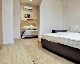 Zentrico Hotel - Pereira - Schlafzimmer
