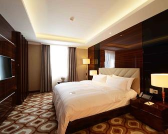 Lotte City Hotel Tashkent Palace - Tashkent - Bedroom