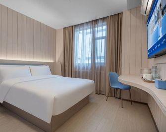 Hanting Hotel (Urumqi Railway Bureau) - Ürümqi - Habitación