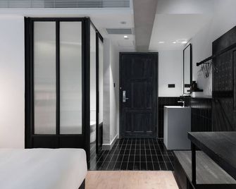 Xuli Travel Hotel (Chengdu Taikoo Li Chunxi Road Branch) - Chengdu - Bedroom