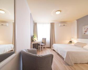 Hotel Toskana - ויסבאדן - חדר שינה