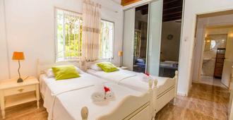 The Orchard Holiday Home - Grand'Anse Mahé - Bedroom