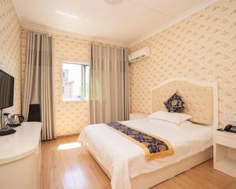 Jingdezhen Jingsheng Hotel - Jingdezhen - Habitación