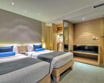 Ashlee Heights Hotel Patong - Patong - Bedroom