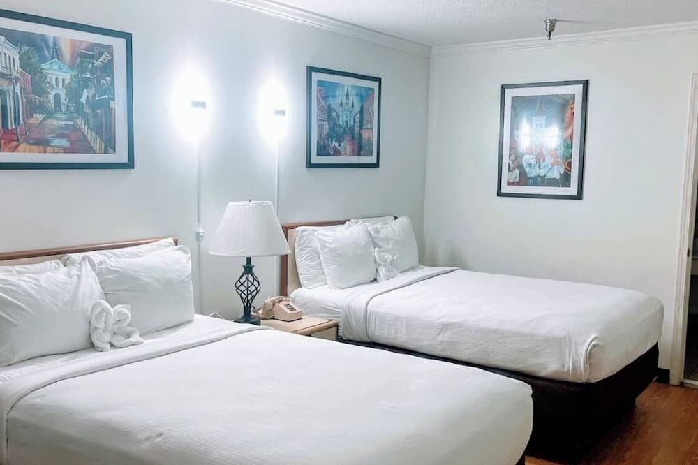 Contempra Inn - Kenner - Schlafzimmer