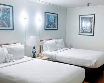 Contempra Inn - Kenner - Bedroom