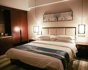 Hongsheng Hotel - Suining - Schlafzimmer