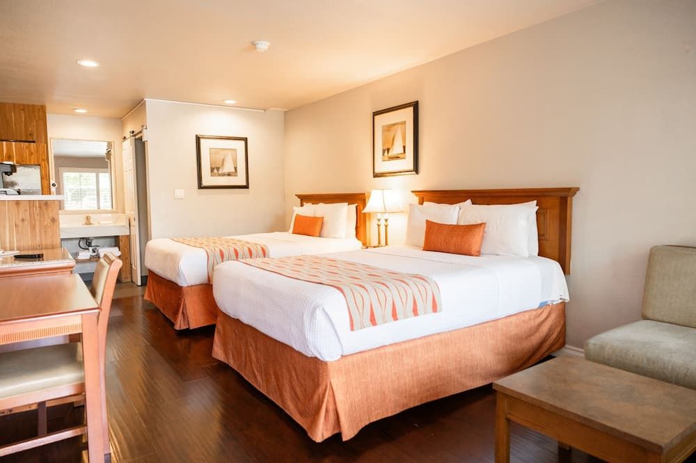 نزل وأجنحة - مركز مؤتمرات ألامو