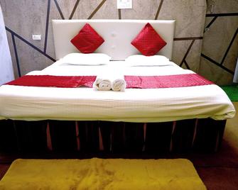 The Escapee Resort - מוסורי - חדר שינה