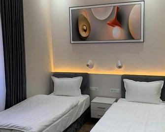 Central Plaza Hotel - Urgench - Bedroom