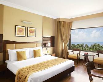 더 리트리트 호텔 & 컨벤션 센터 - 뭄바이 - 침실
