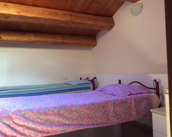 Il mondo roverso - Feltre - Schlafzimmer