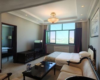 Tarim Petroleum Hotel - Kashgar - Bedroom