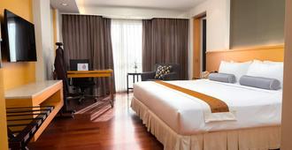 Lao Plaza Hotel - ויינטיאן - חדר שינה