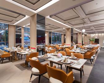 Ramada Plaza by Wyndham Poyang - Джіндежен - Ресторан