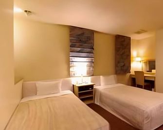 Leo Plaza Hotel - Sasebo - Schlafzimmer