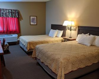 Sagebrush Inn and Suites - Broadus - Bedroom